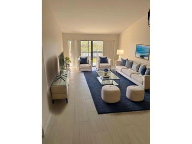 UPDATED 2ND FLOOR CONDO FEATURING WHITE EAT-IN KITCHEN WITH NEW - photo 1
