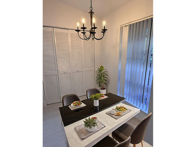 UPDATED 2ND FLOOR CONDO FEATURING WHITE EAT-IN KITCHEN WITH NEW - photo 5