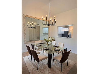 UPDATED 2ND FLOOR CONDO FEATURING WHITE EAT-IN KITCHEN WITH NEW - photo 6