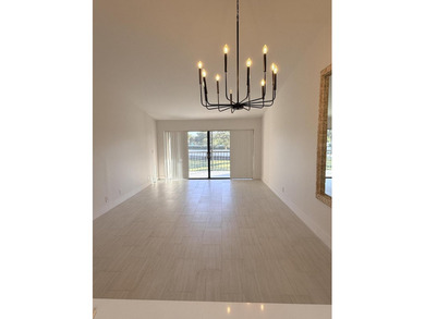 UPDATED 2ND FLOOR CONDO FEATURING WHITE EAT-IN KITCHEN WITH NEW - photo 7
