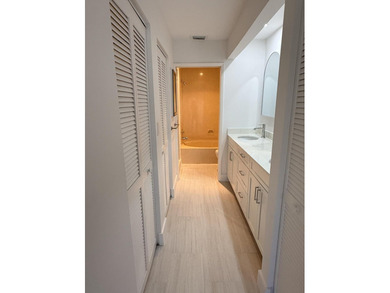 UPDATED 2ND FLOOR CONDO FEATURING WHITE EAT-IN KITCHEN WITH NEW - photo 10