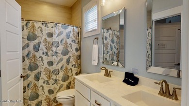 Turnkey investment opportunity or coastal retreat in The Cove at