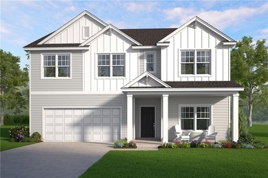 The Magnolia plan by Smith Family Homes is under construction in - photo 1