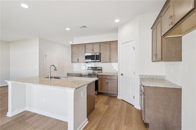 The Magnolia plan by Smith Family Homes is under construction in - photo 5