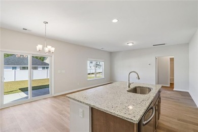 The Magnolia plan by Smith Family Homes is under construction in - photo 6