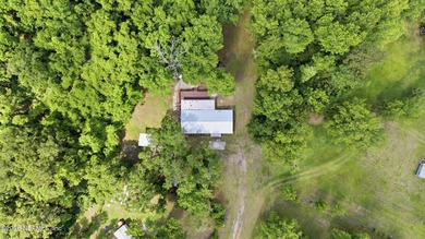 Move in ready on one acre of private land! Country feel, city - photo 36