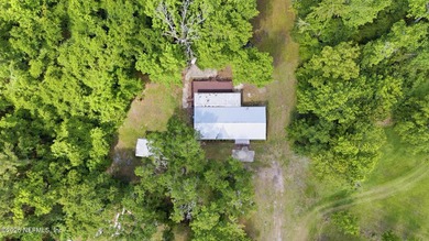 Move in ready on one acre of private land! Country feel, city - photo 37