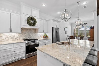 This fully custom, full-brick home sits on just under an acre in - photo 7