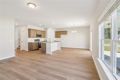The Magnolia plan by Smith Family Homes is under construction in - photo 9