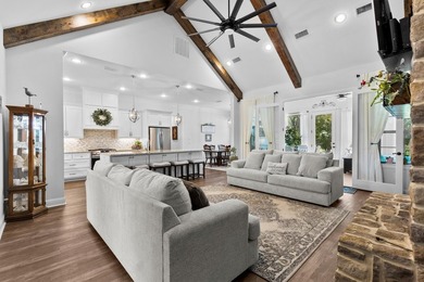 This fully custom, full-brick home sits on just under an acre in - photo 10