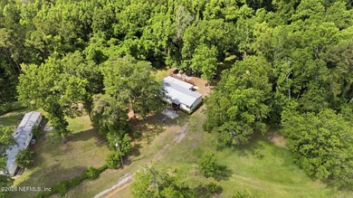Move in ready on one acre of private land! Country feel, city - photo 41
