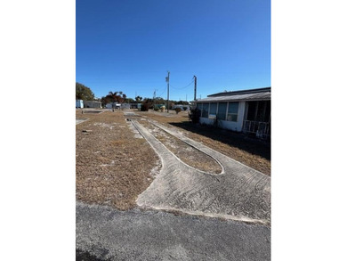 55 + CO-OP Community, Whispering Creek. Vacant Lot...Ready for - photo 2