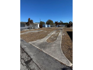 55 + CO-OP Community, Whispering Creek. Vacant Lot...Ready for - photo 3