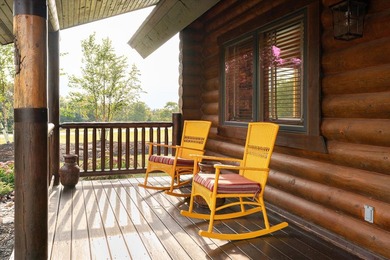 This custom log home was professionally designed and built in - photo 5