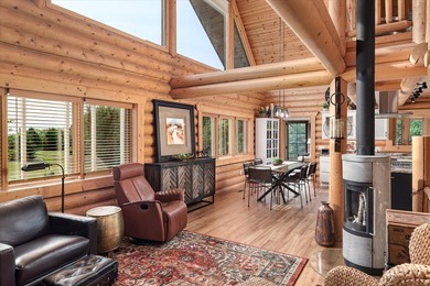 This custom log home was professionally designed and built in - photo 7