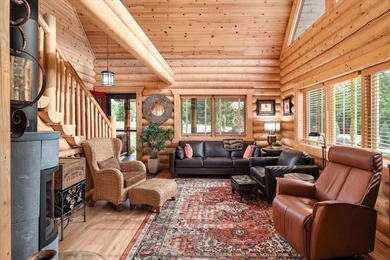 This custom log home was professionally designed and built in - photo 8