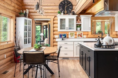 This custom log home was professionally designed and built in - photo 9