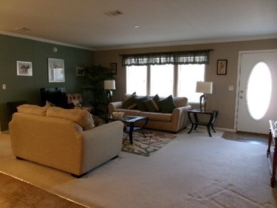 Spacious 2013 JACB mobile home featuring 3 bedrooms, 2 bathrooms - photo 3