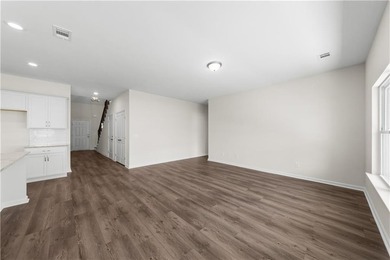 The Dogwood floorplan by Smith Family Homes is under - photo 4