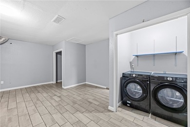 Welcome home to this beautifully remodeled 5-bedroom, 2 full - photo 18