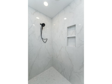 Situated on a 0.27-acre lot in the desirable Century Valley