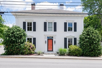 This beautiful 3,238 square foot c. 1832 Italianate sits in the - photo 2