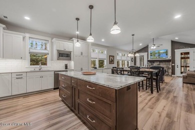 Nestled among mature trees in a private waterside setting, this - photo 6