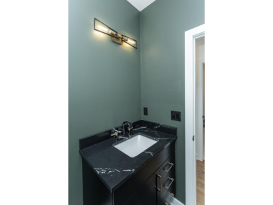 Situated on a 0.27-acre lot in the desirable Century Valley