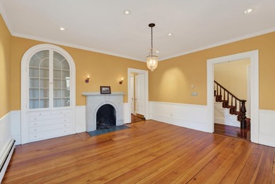 This beautiful 3,238 square foot c. 1832 Italianate sits in the - photo 6