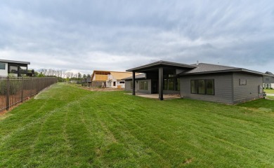 Situated on a 0.27-acre lot in the desirable Century Valley