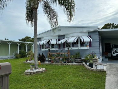 Beautifully maintained, partially furnished 2BR/2BA home located - photo 2