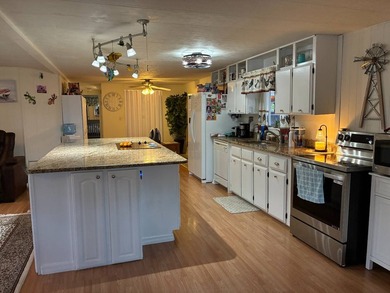 Beautifully maintained, partially furnished 2BR/2BA home located - photo 6