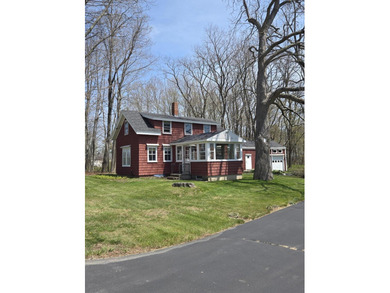 This unique cottage-style property in Falmouth, Maine, is a rare - photo 1