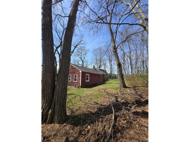 This unique cottage-style property in Falmouth, Maine, is a rare - photo 5