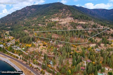 An exclusive estate property with panoramic lake views! This - photo 2