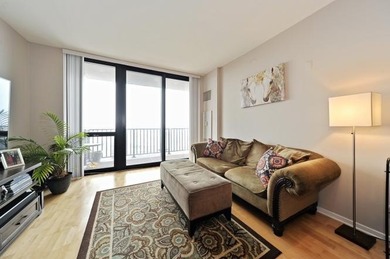 Sun-filled high-floor one-bedroom residence with unobstructed