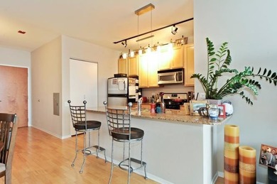 Sun-filled high-floor one-bedroom residence with unobstructed