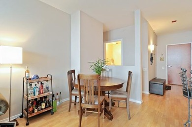 Sun-filled high-floor one-bedroom residence with unobstructed