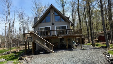 Nestled in the amenity-filled community of The Hideout, this - photo 1