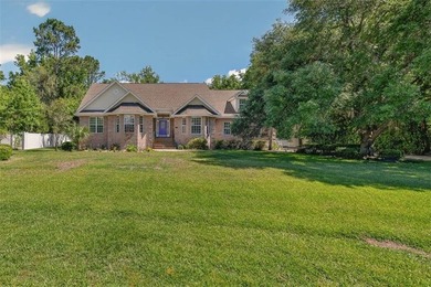 Welcome to Oak Grove Island, where this beautifully maintained - photo 1