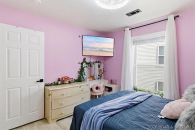 Enjoy the best of lake living in this beautifully renovated 3 - photo 12