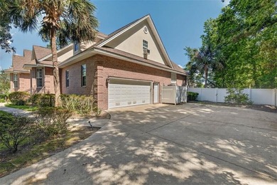 Welcome to Oak Grove Island, where this beautifully maintained - photo 2
