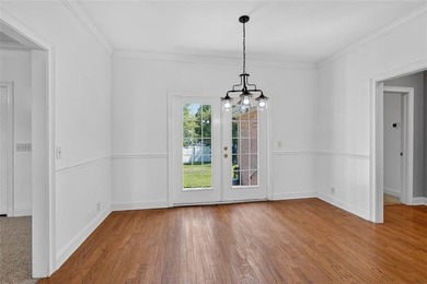 Welcome to Oak Grove Island, where this beautifully maintained - photo 5