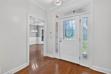 Welcome to Oak Grove Island, where this beautifully maintained - photo 6