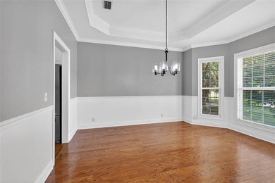 Welcome to Oak Grove Island, where this beautifully maintained - photo 9