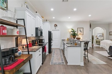 IMMACULATE AND GORGEOUS! IMPECCABLE landscaping! Great open - photo 10