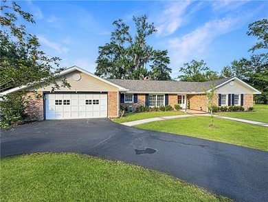 Welcome to this expansive waterfront retreat situated on over an - photo 3