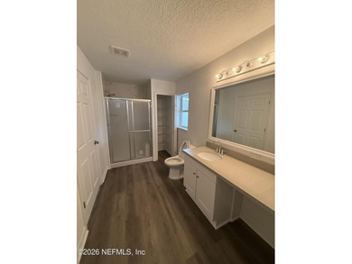 Welcome home to this beautifully remodeled home, sitting on a - photo 13