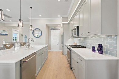 Welcome to this beautiful coastal townhome in the highly - photo 14