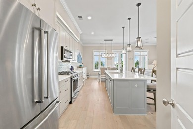 Welcome to this beautiful coastal townhome in the highly - photo 15